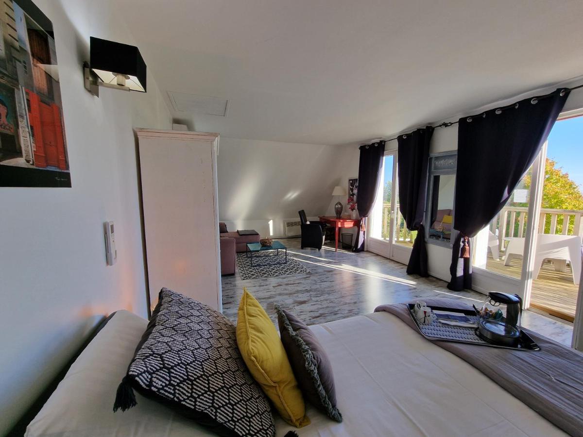 Un ou plusieurs lits dans un hébergement de l'établissement Les Terrasses de Saumur - Hôtel & Appartements - Restaurant & Spa (Logis)