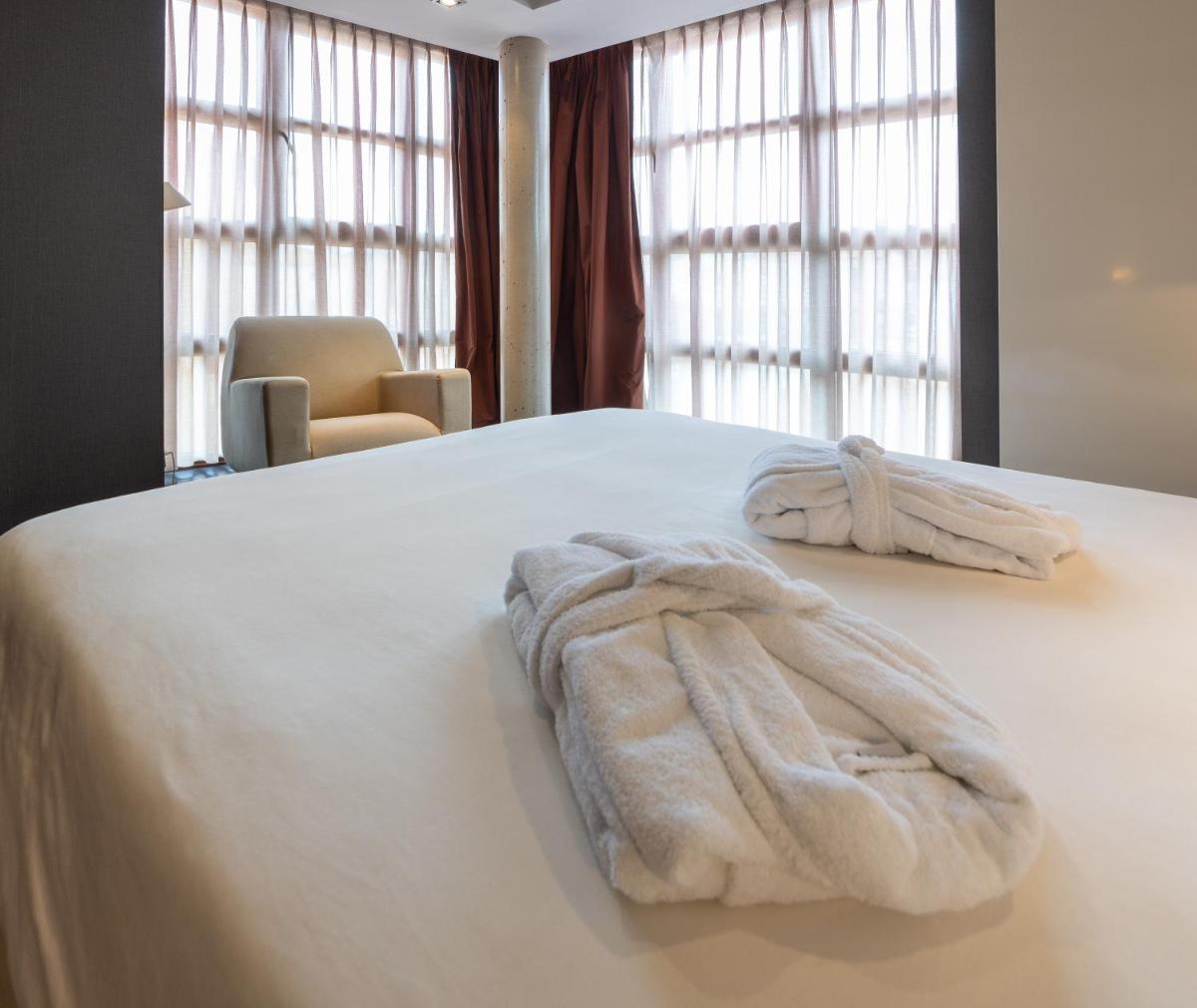 Cama o camas de una habitación en Hotel La Trufa Negra