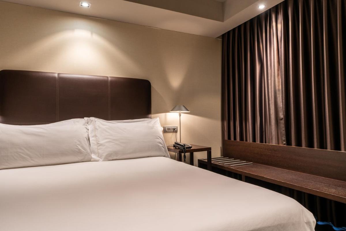 Cama o camas de una habitación en Hotel La Trufa Negra