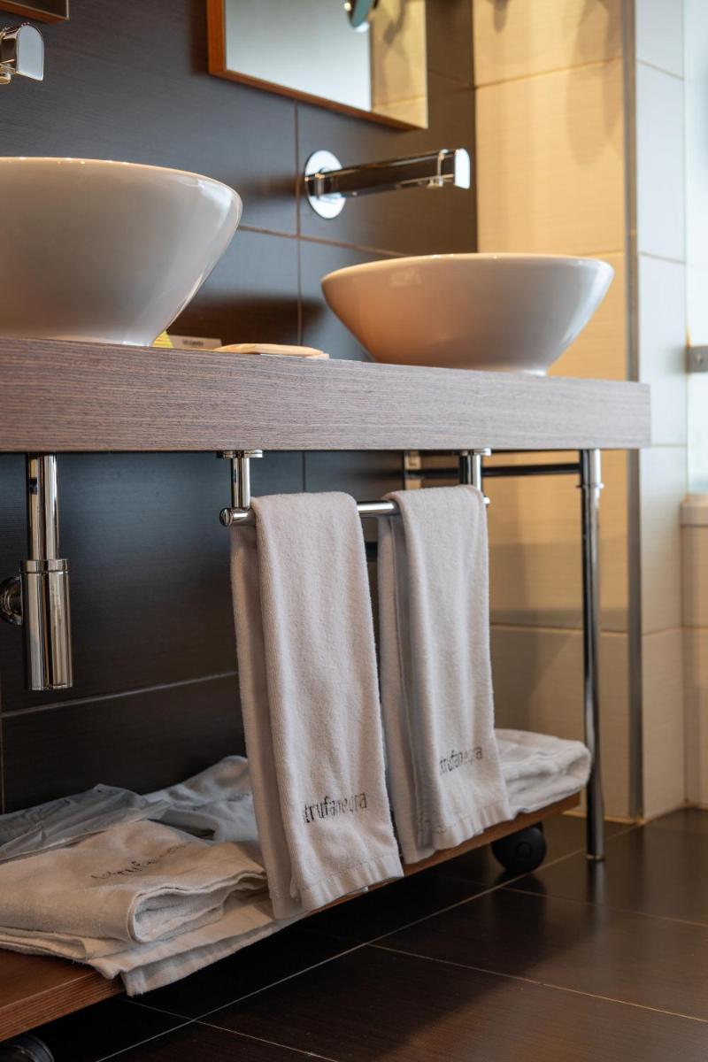 Cama o camas de una habitación en Hotel La Trufa Negra