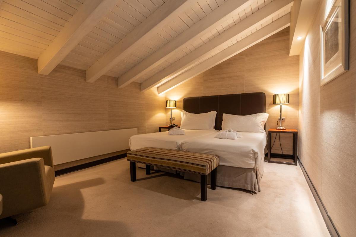 Cama o camas de una habitación en Hotel La Trufa Negra
