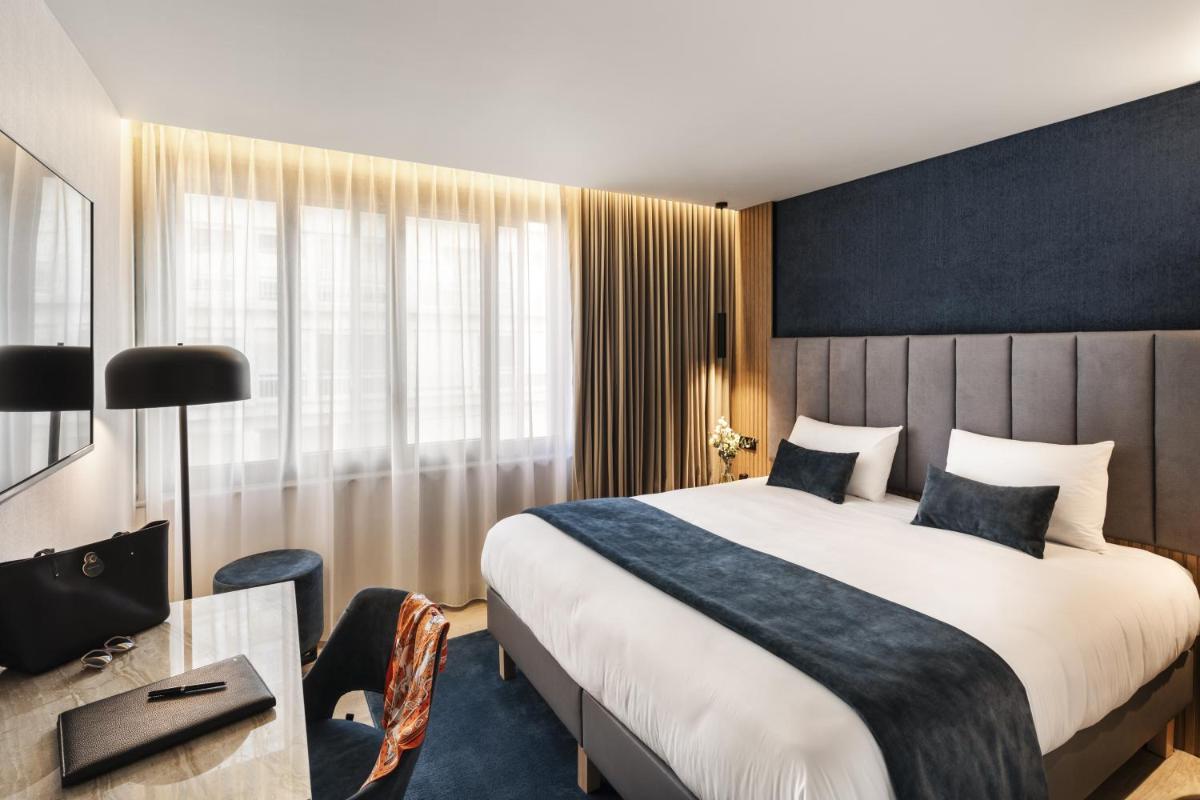 Un ou plusieurs lits dans un hébergement de l'établissement Hôtel & Spa Le Maury, Vannes, The Originals Boutique