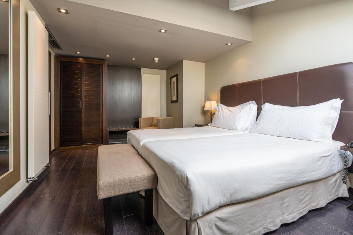 Cama o camas de una habitación en Hotel La Trufa Negra