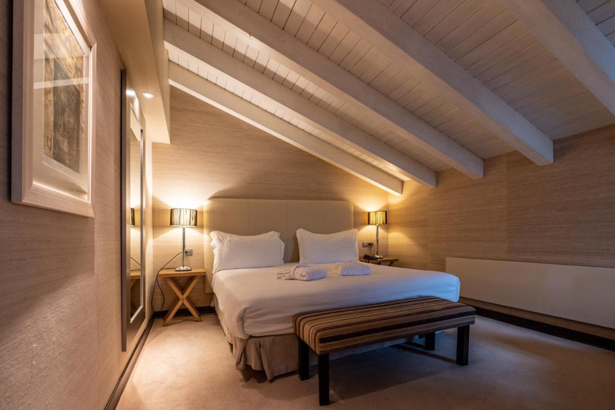 Cama o camas de una habitación en Hotel La Trufa Negra