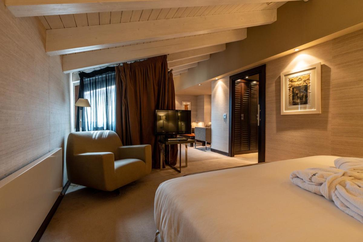 Cama o camas de una habitación en Hotel La Trufa Negra