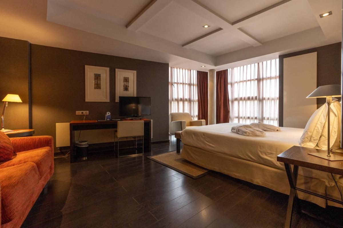 Cama o camas de una habitación en Hotel La Trufa Negra