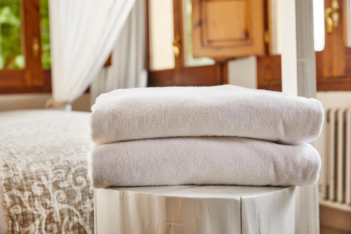 Cama o camas de una habitación en Mas Salagros EcoResort & SPA