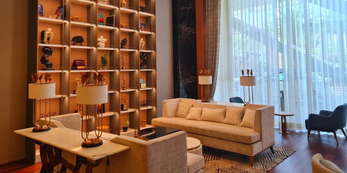 a living room with a couch and a table at InterContinental Jaipur Tonk Road by IHG in Jaipur
