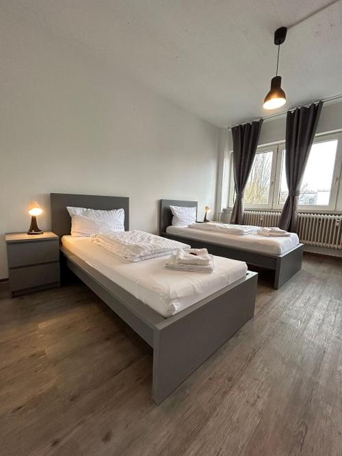 Gästezimmer 11 Citynah, Küche & Bad extern - Housity