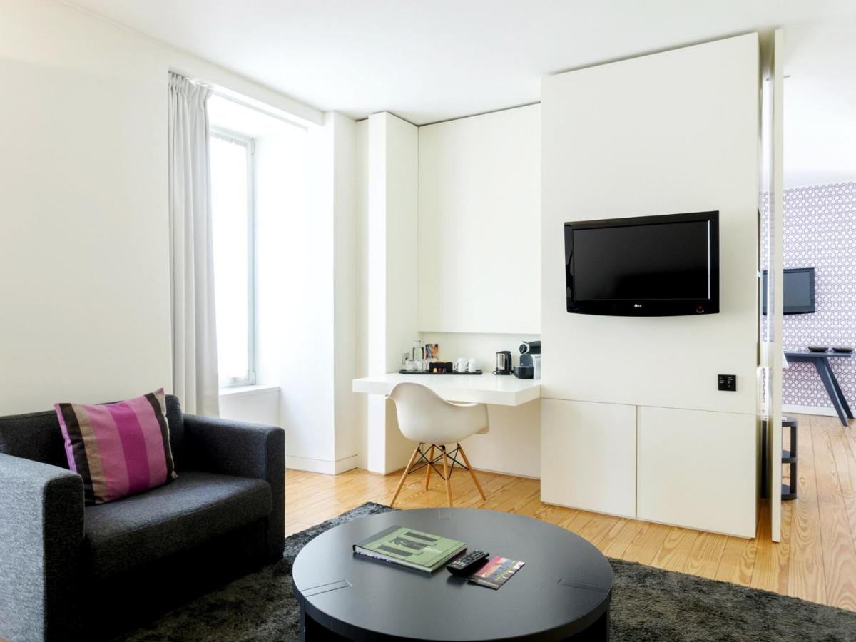 Uma televisão e/ou sistema de entretenimento em Inspira Liberdade Boutique Hotel