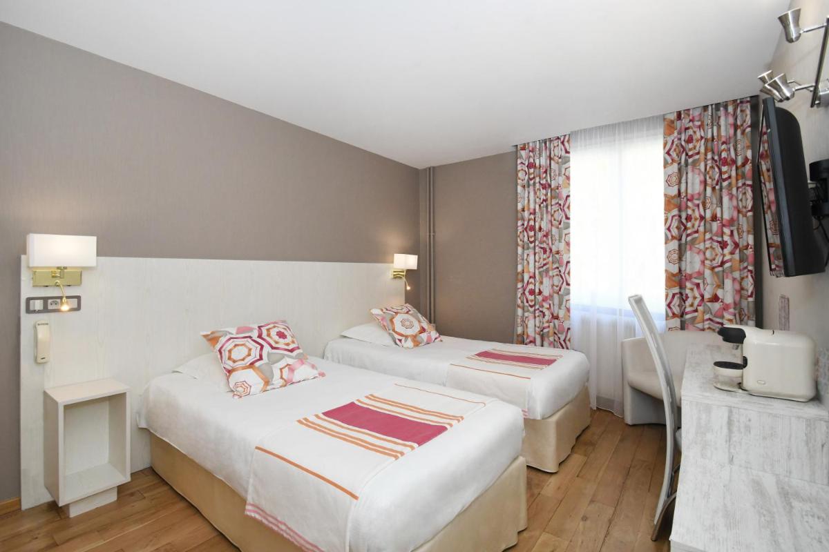 Logis Hôtel du Centre - Halte idéale en cyclotourisme avec garage à vélos clos - Housity