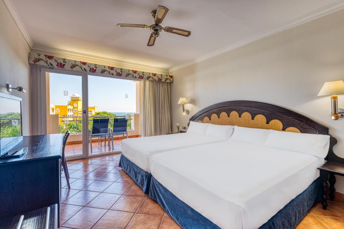 Cama o camas de una habitación en Playazimbali