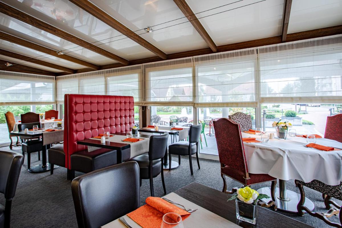 Coin salon dans l'établissement Europe Haguenau – Hotel & Spa