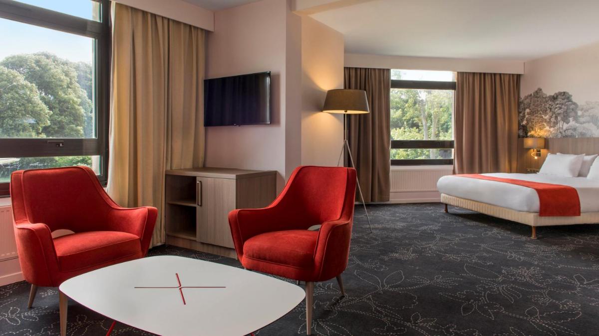 Un ou plusieurs lits dans un hébergement de l'établissement Holiday Inn Calais Coquelles by IHG