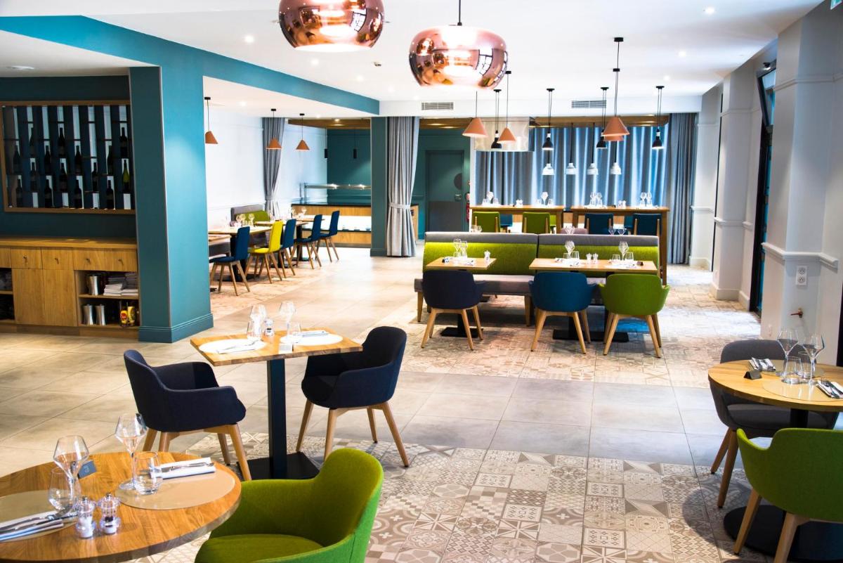 Restaurant ou autre lieu de restauration dans l'établissement Holiday Inn Calais Coquelles by IHG