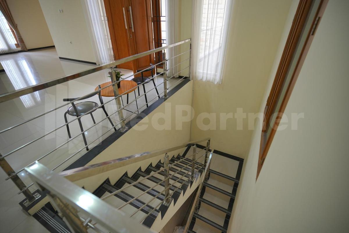 One & Quin Guest House Syariah Mitra RedDoorz - Housity