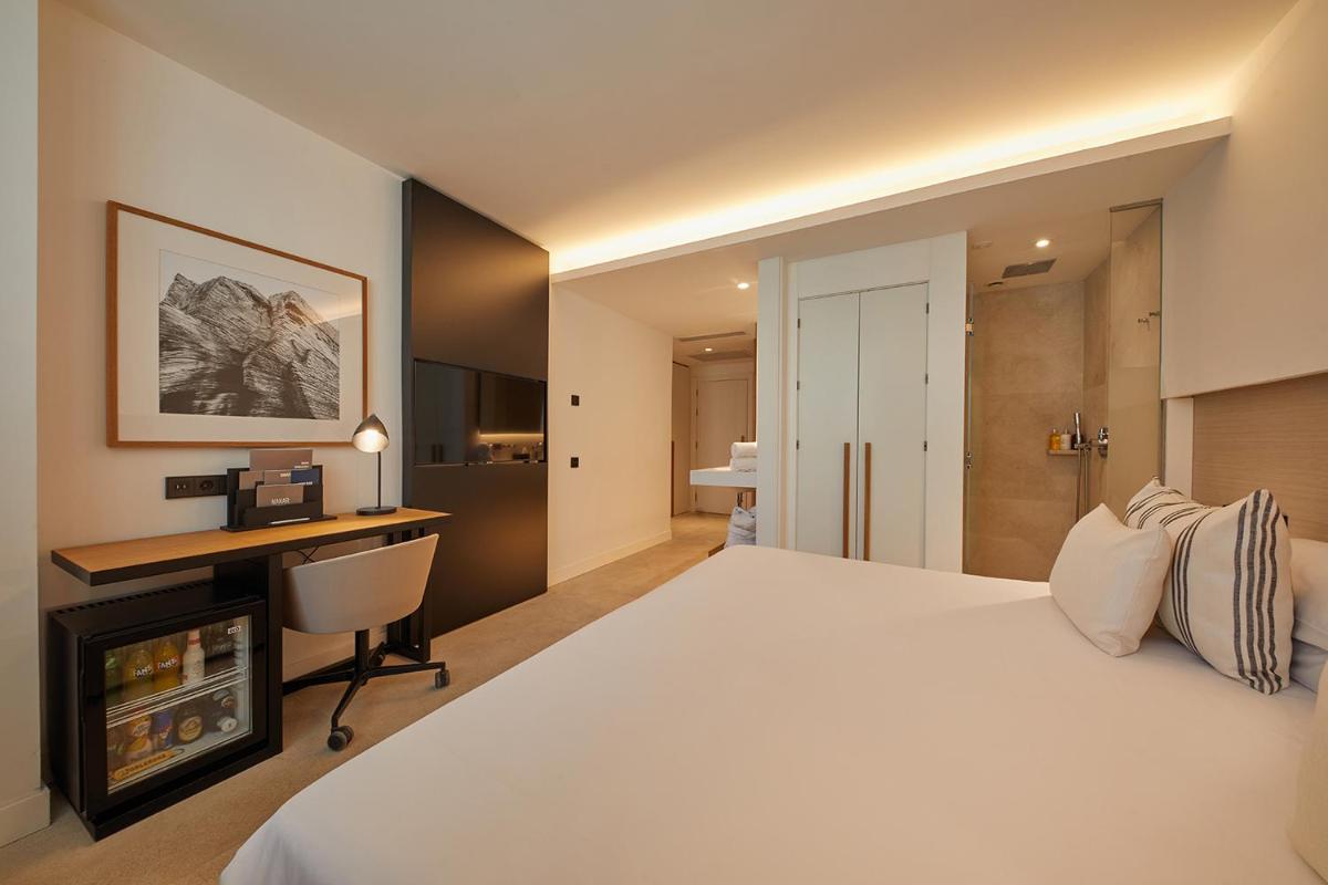 Cama o camas de una habitación en Nakar Hotel