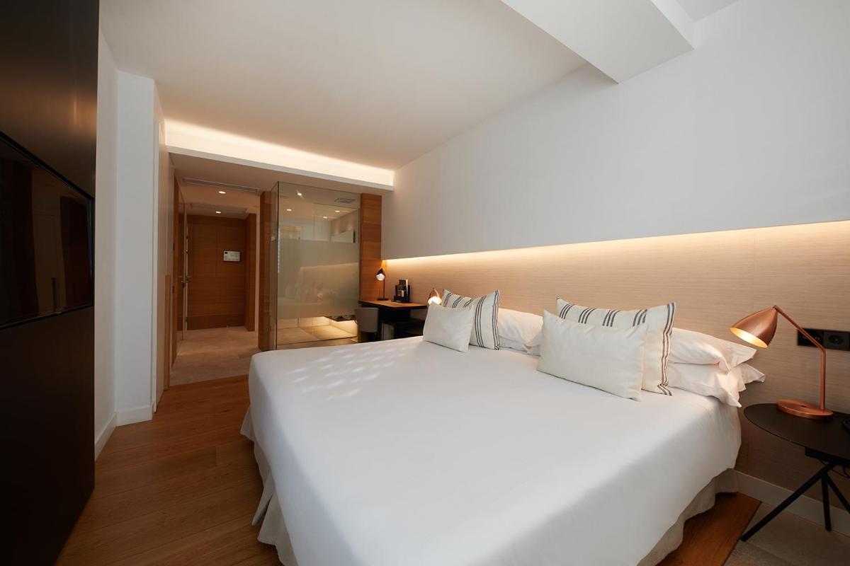 Cama o camas de una habitación en Nakar Hotel