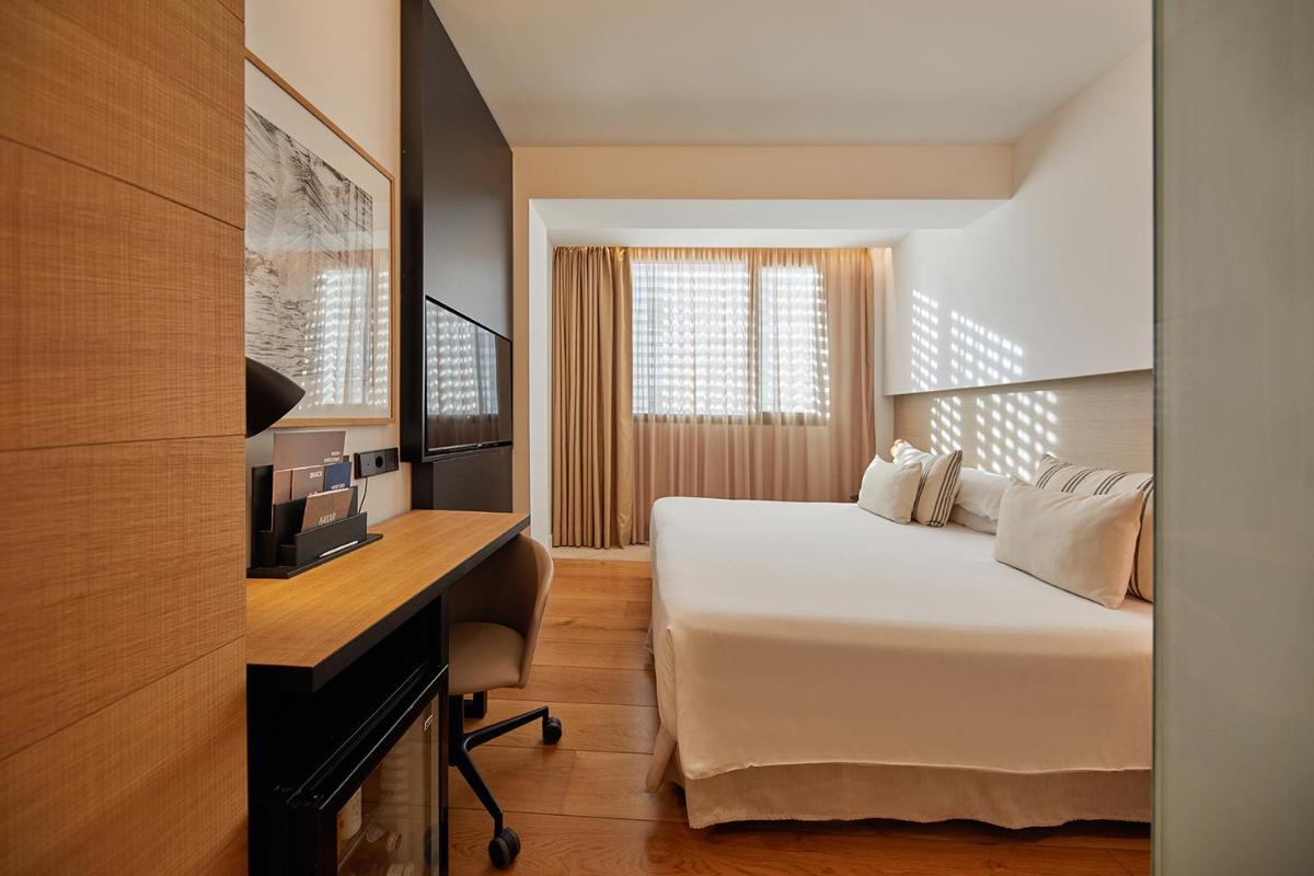 Cama o camas de una habitación en Nakar Hotel
