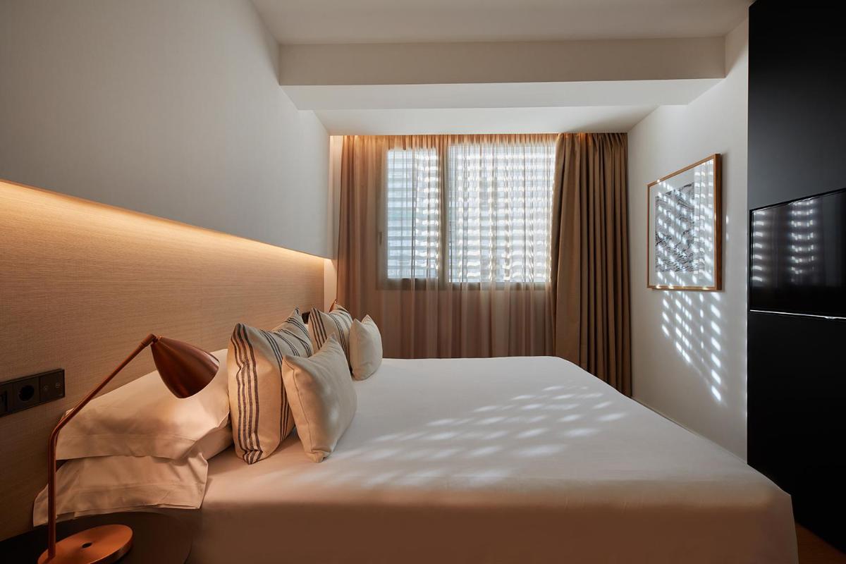 Cama o camas de una habitación en Nakar Hotel