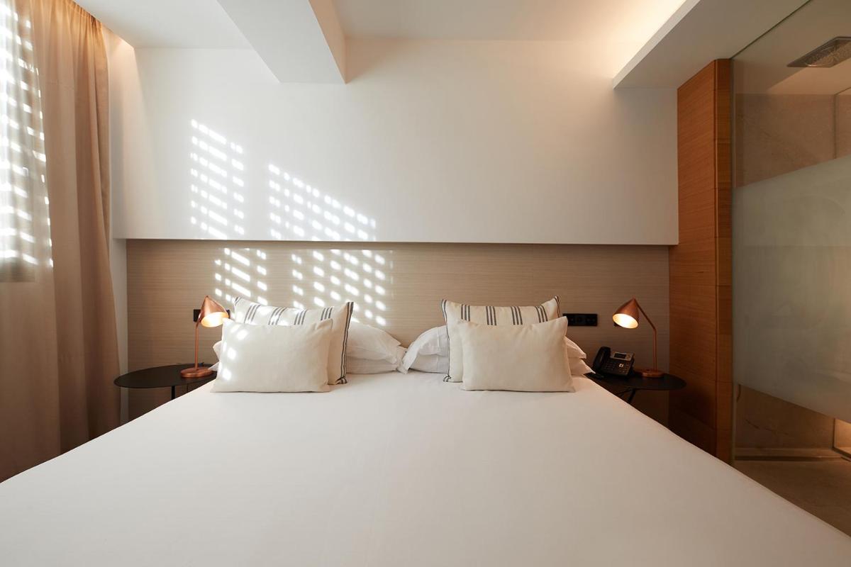 Cama o camas de una habitación en Nakar Hotel