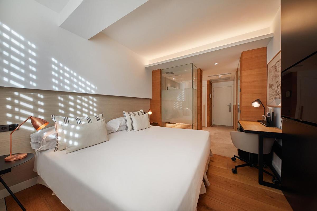Cama o camas de una habitación en Nakar Hotel