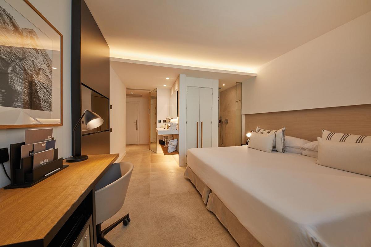 Cama o camas de una habitación en Nakar Hotel