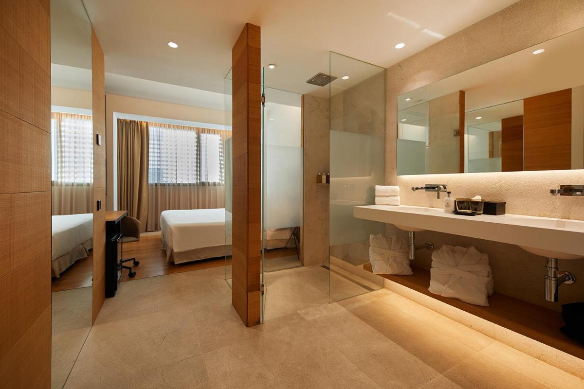 Cama o camas de una habitación en Nakar Hotel