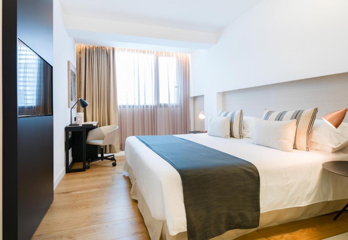 Cama o camas de una habitación en Nakar Hotel