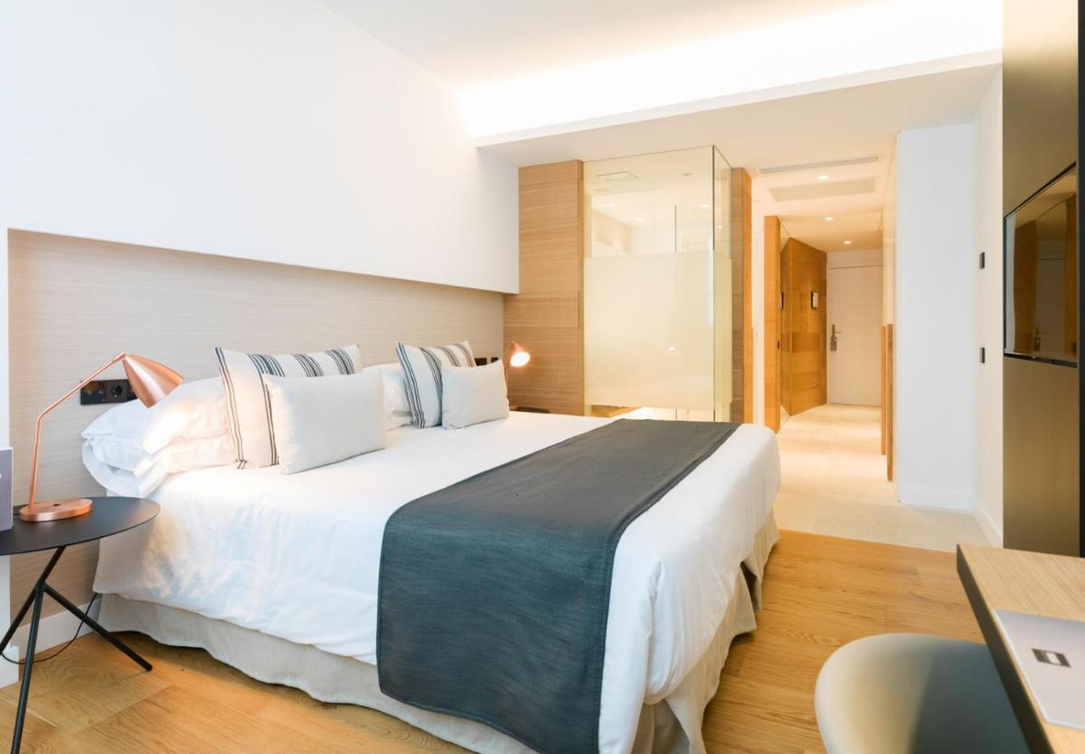Cama o camas de una habitación en Nakar Hotel
