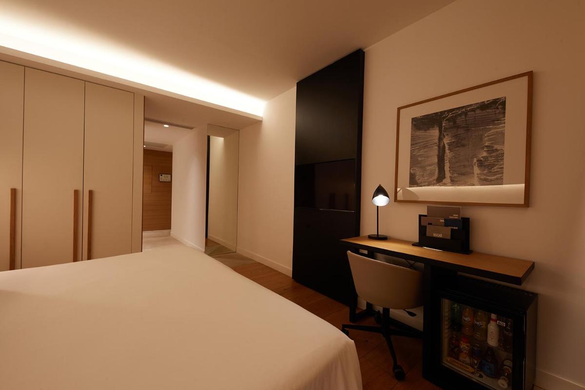 Cama o camas de una habitación en Nakar Hotel