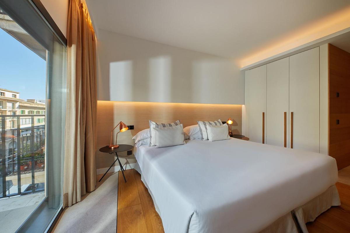 Cama o camas de una habitación en Nakar Hotel