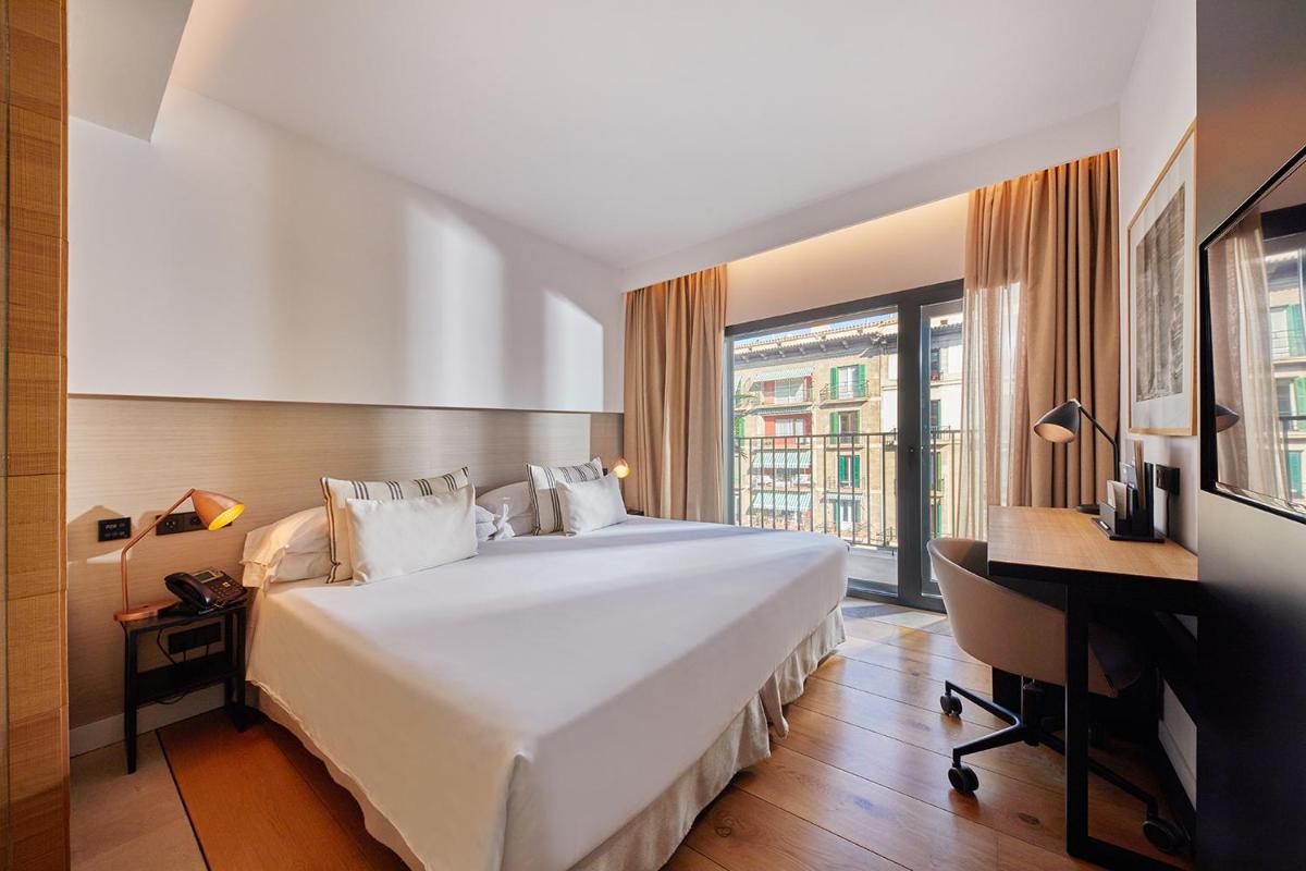 Cama o camas de una habitación en Nakar Hotel