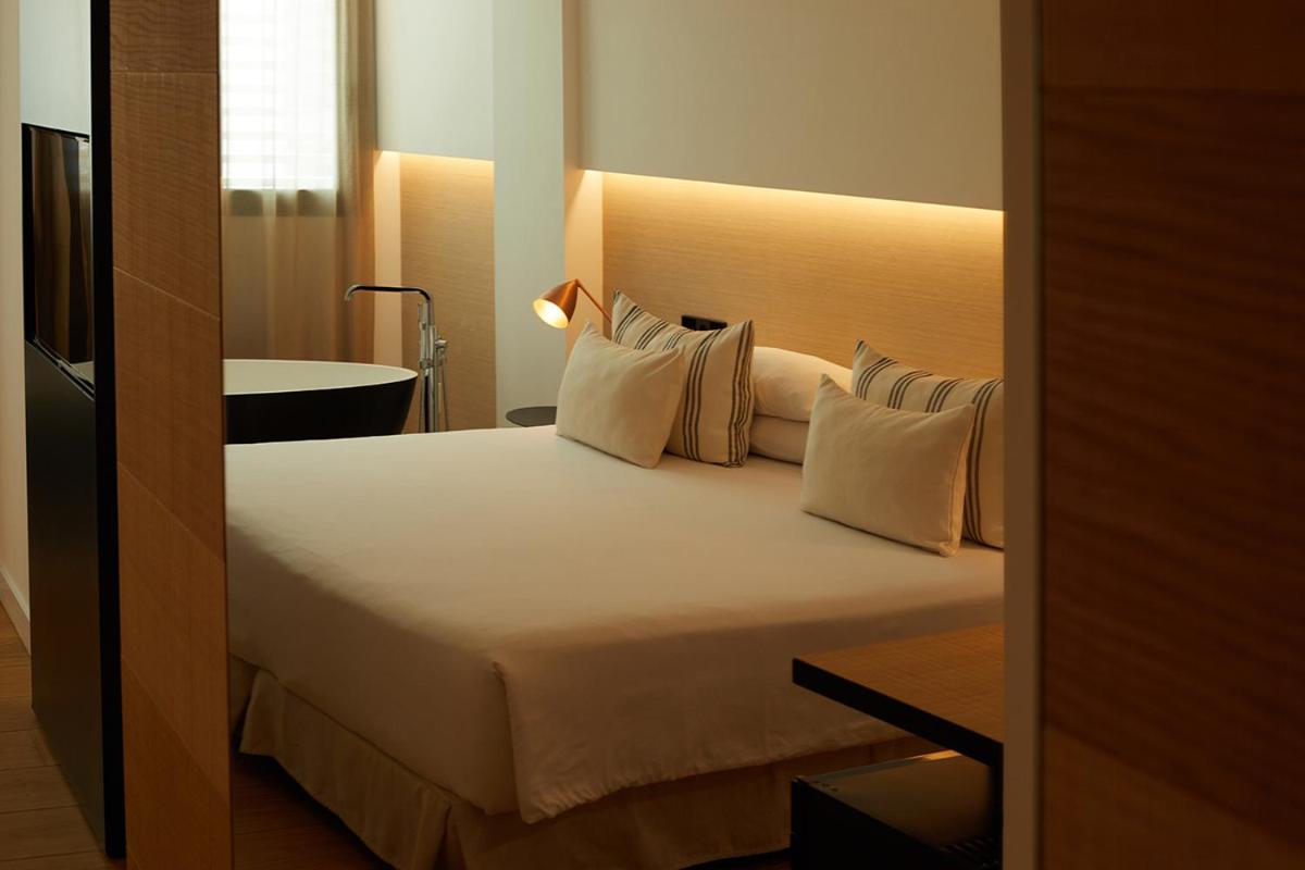 Cama o camas de una habitación en Nakar Hotel