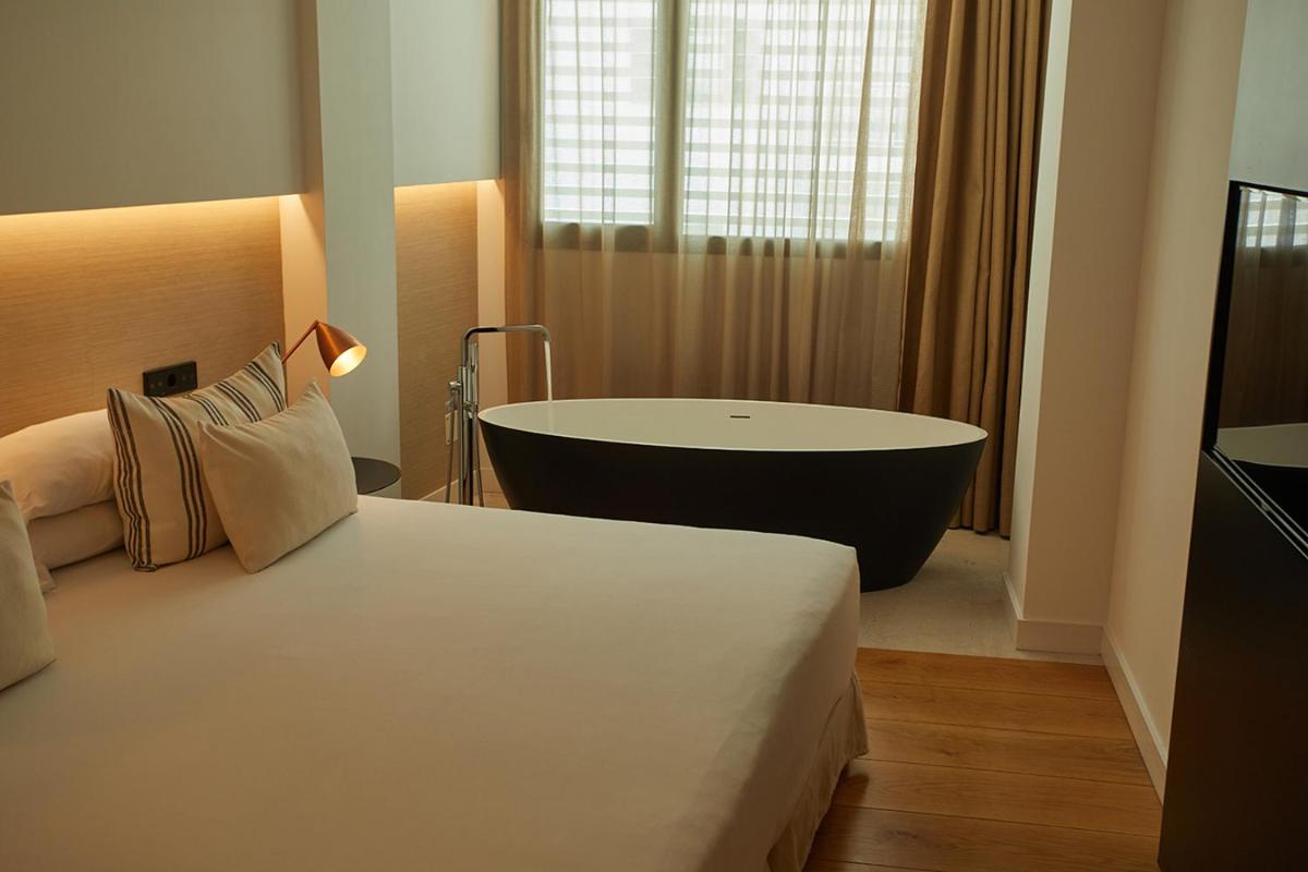 Cama o camas de una habitación en Nakar Hotel