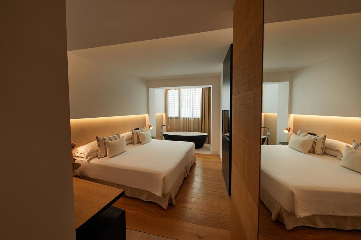 Cama o camas de una habitación en Nakar Hotel