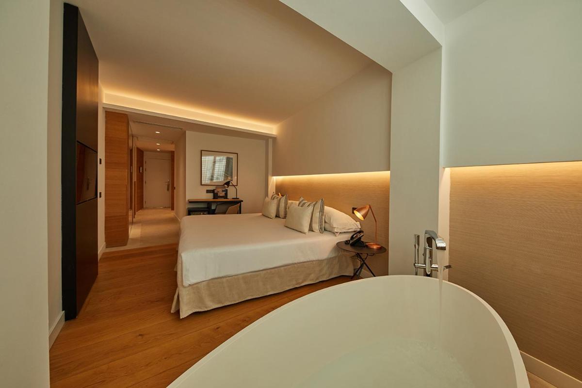 Cama o camas de una habitación en Nakar Hotel