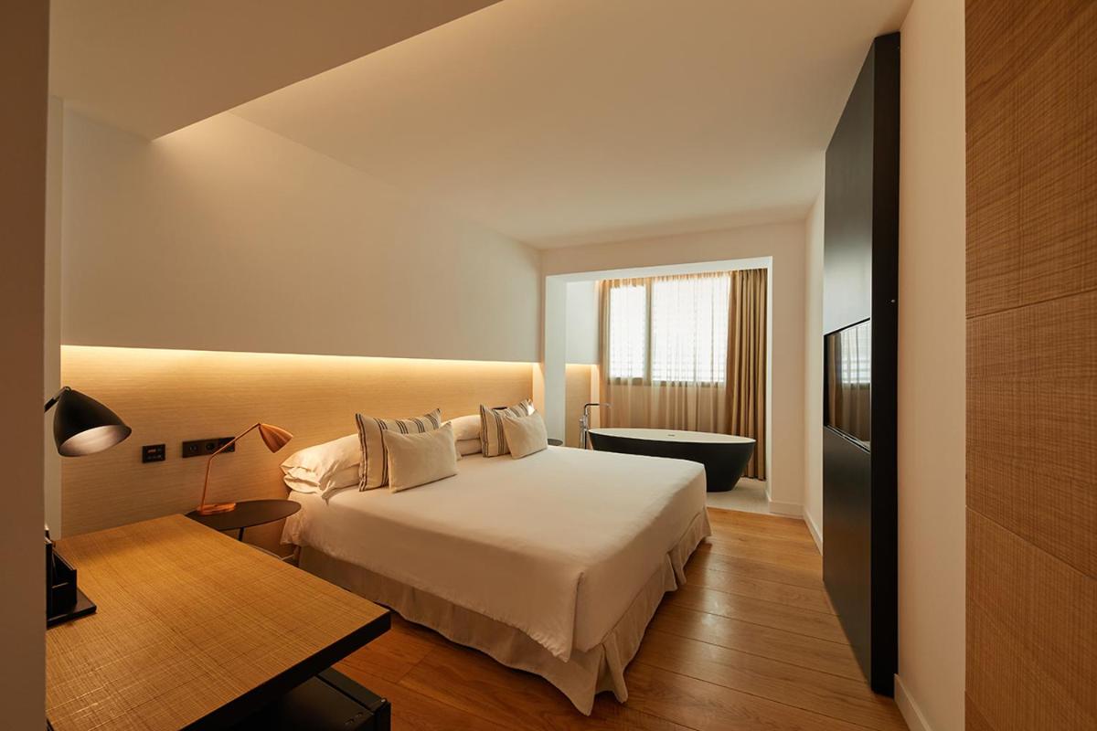 Cama o camas de una habitación en Nakar Hotel