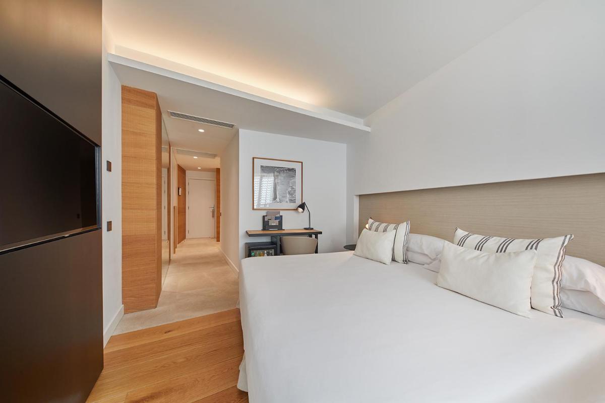 Cama o camas de una habitación en Nakar Hotel