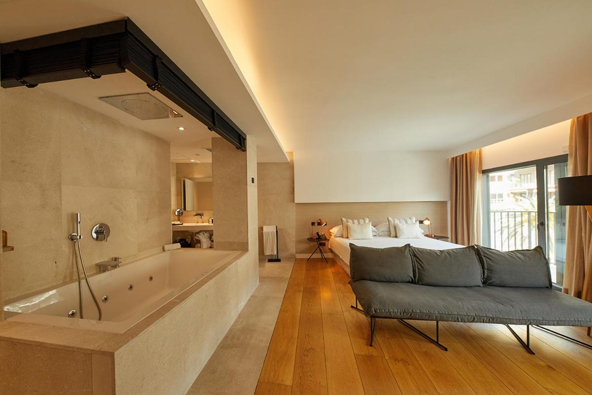Cama o camas de una habitación en Nakar Hotel