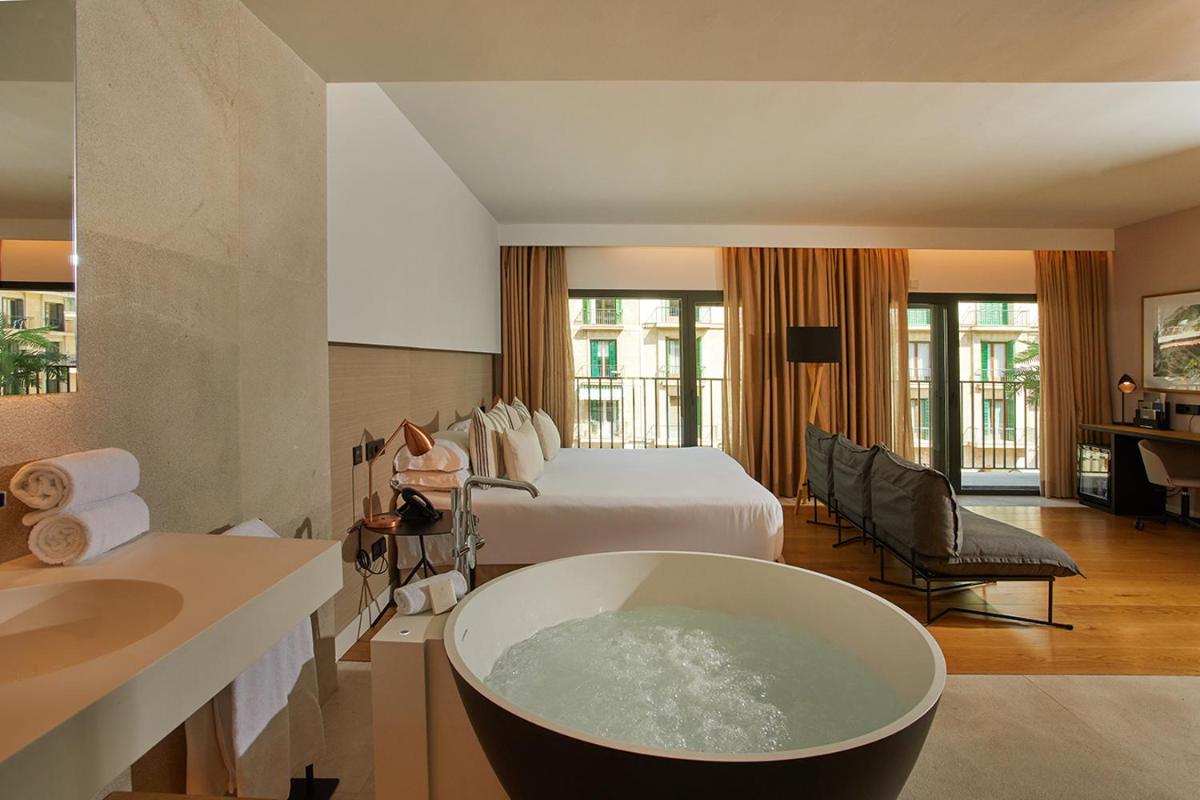 Cama o camas de una habitación en Nakar Hotel