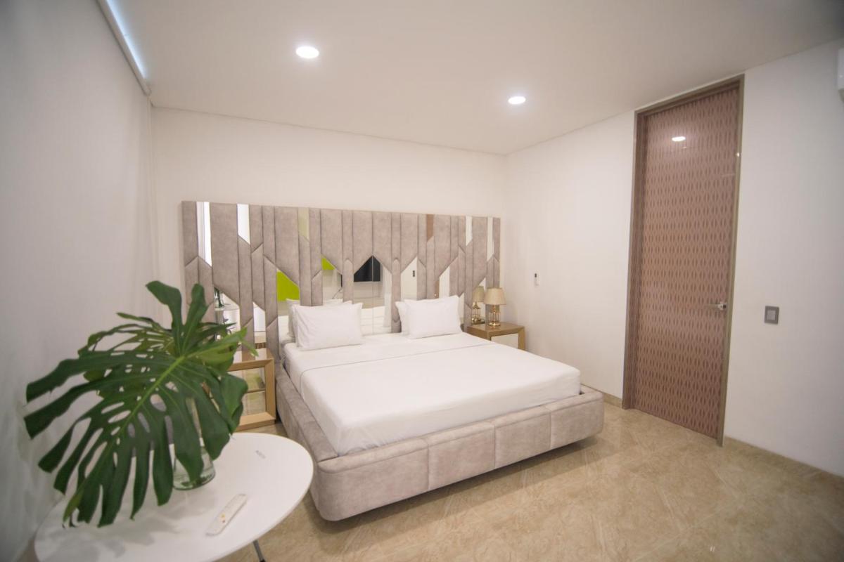 Loto Hotel Boutique Ciudad Jardin - Housity
