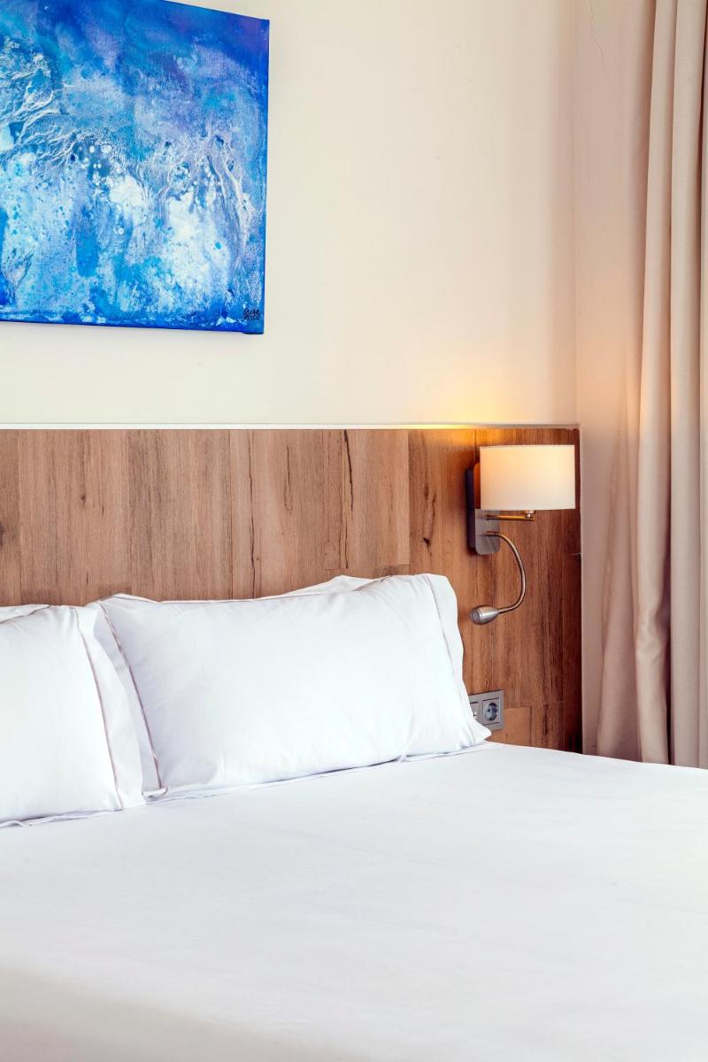 Cama o camas de una habitación en Playasol