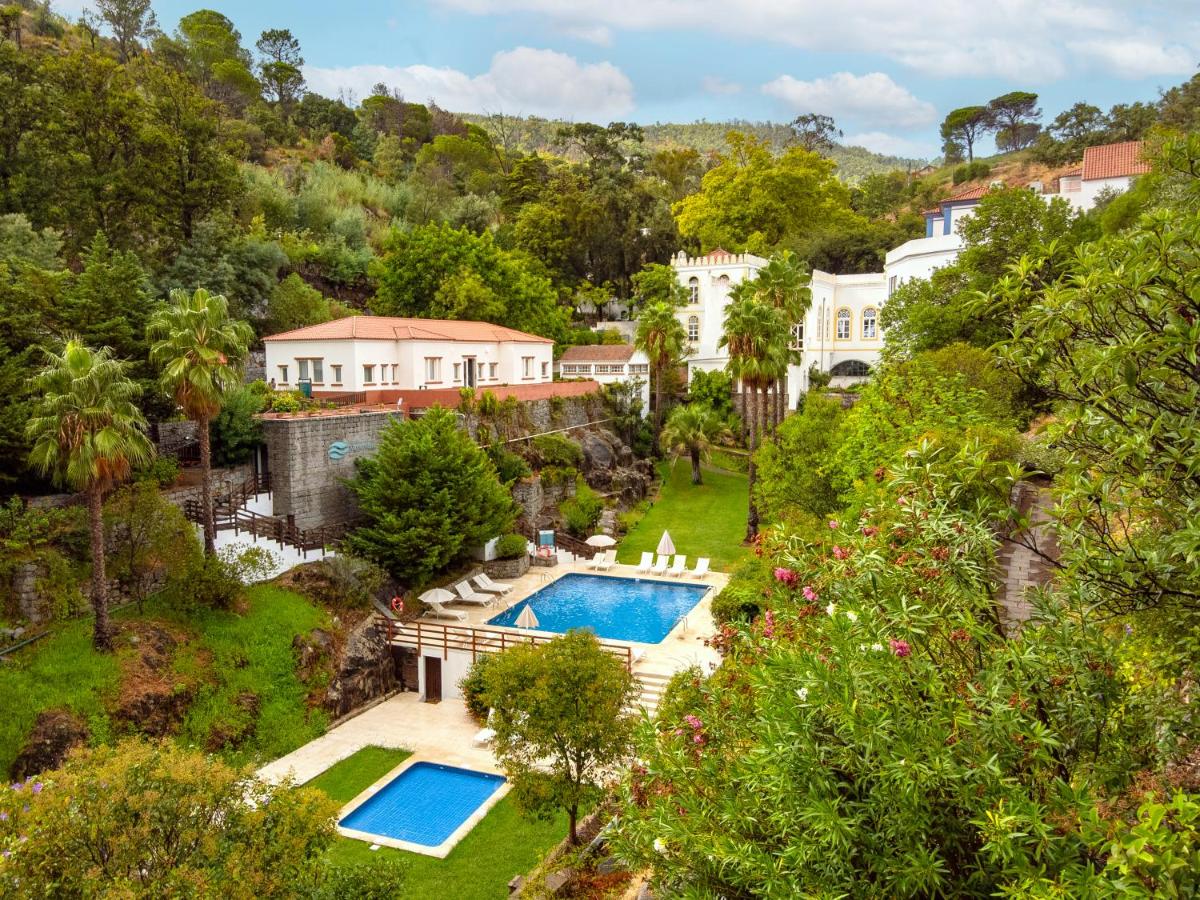 uma vista aérea de uma casa com piscina em Central Monchique Hotel - Villa Termal Spa Resort - by Unlock Hotels em Monchique