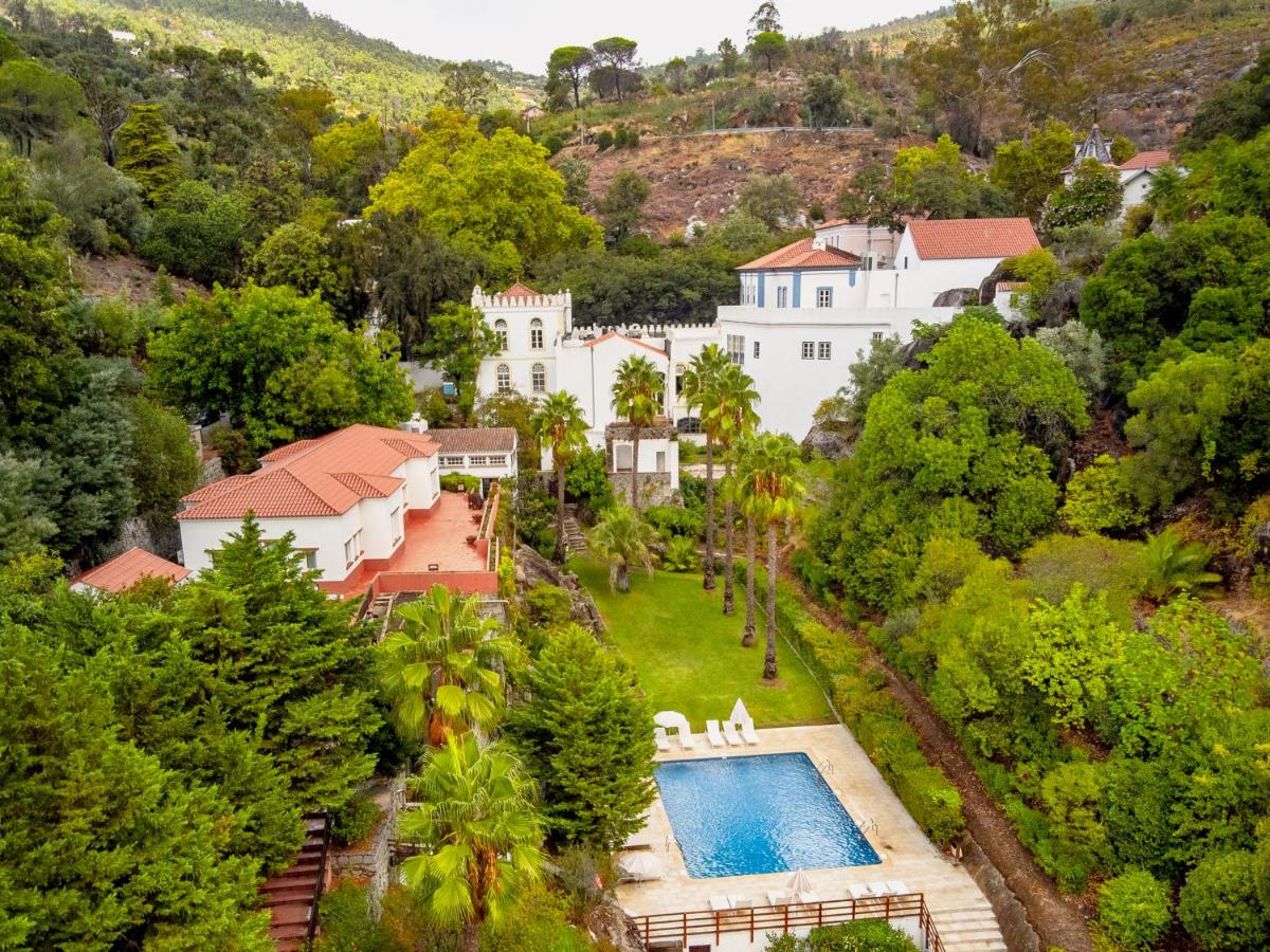 uma vista aérea de uma casa com piscina em Central Monchique Hotel - Villa Termal Spa Resort - by Unlock Hotels em Monchique