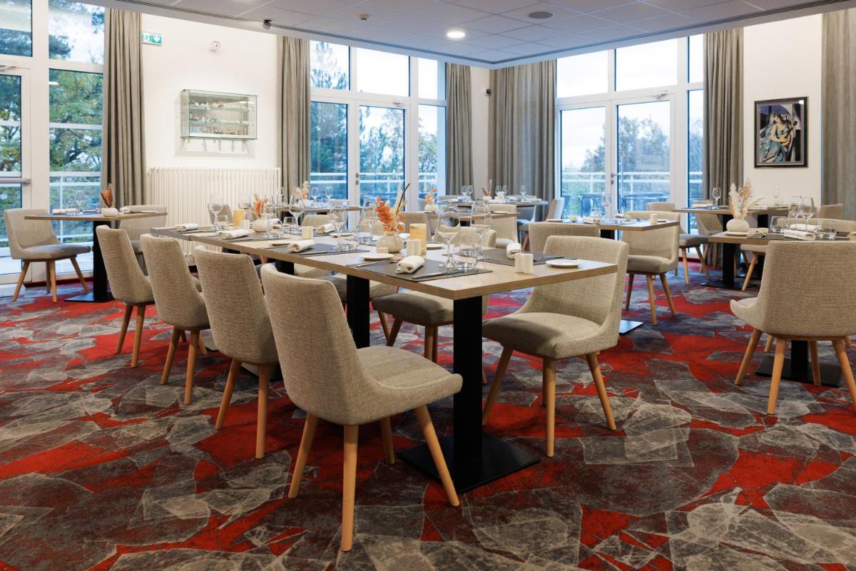 Restaurant ou autre lieu de restauration dans l'établissement Hotel SPA Husseren Collections - Proche Colmar - Eguisheim
