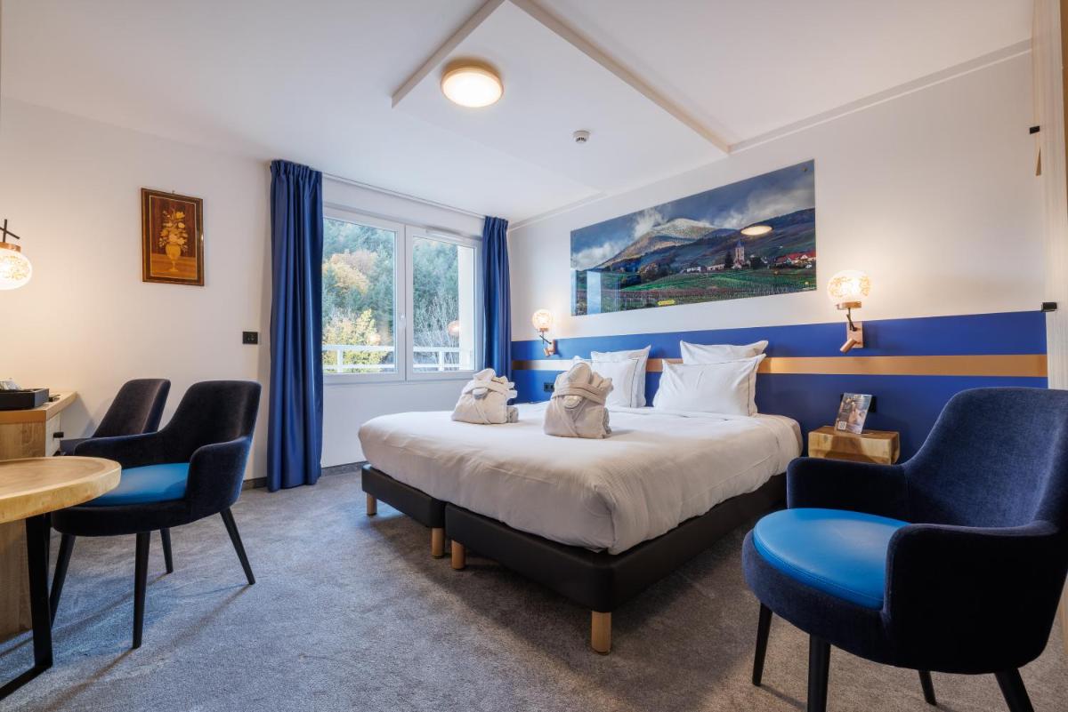 Un ou plusieurs lits dans un hébergement de l'établissement Hotel SPA Husseren Collections - Proche Colmar - Eguisheim
