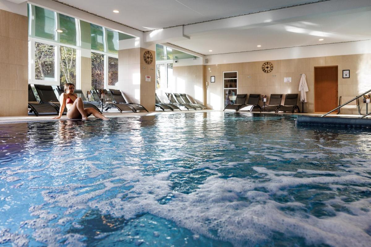 Piscine de l'établissement Hotel SPA Husseren Collections - Proche Colmar - Eguisheim ou située à proximité