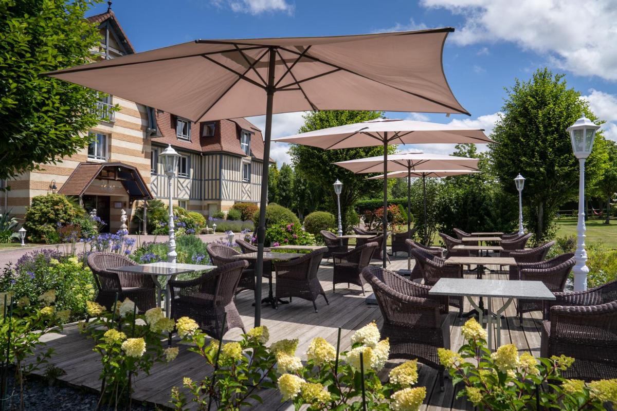Jardin de l'établissement Le Manoir De La Poterie & Spa