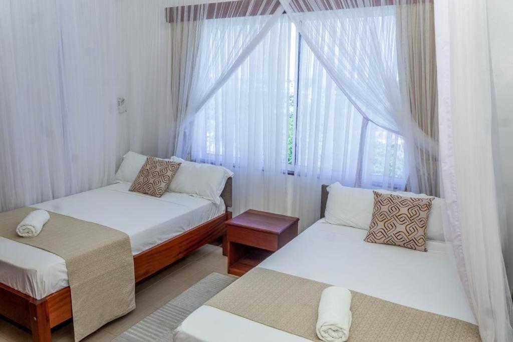 Suitetrails - Ikhaya serviced Apartments With Sea View, Nyali